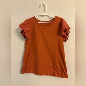 Girls orange short sleeve flutter sleeve shirt